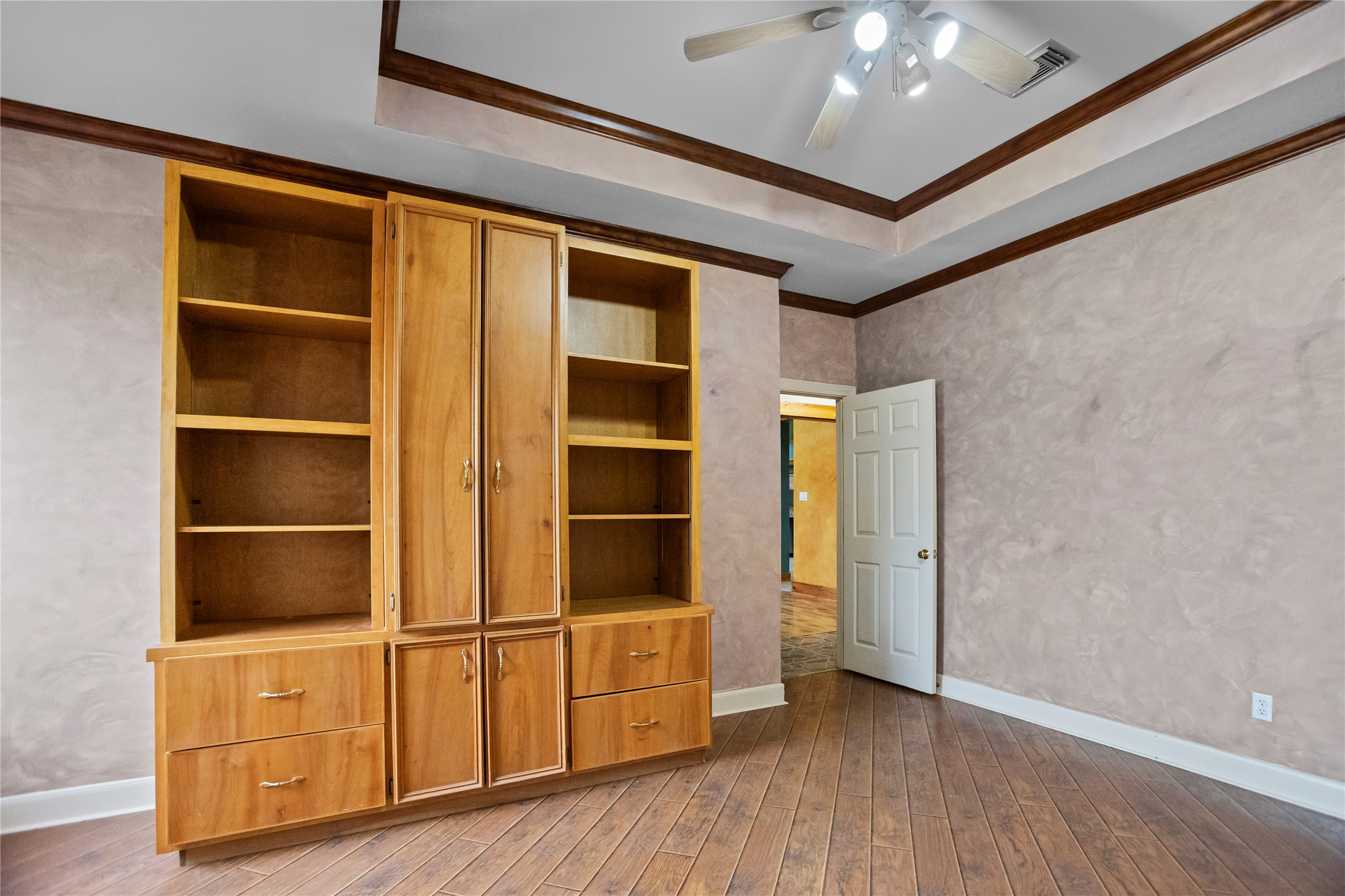 22916 East Martin Drive Porter, TX 77365 - Photo 27 of 43 a view of an empty room with a window and wooden floor