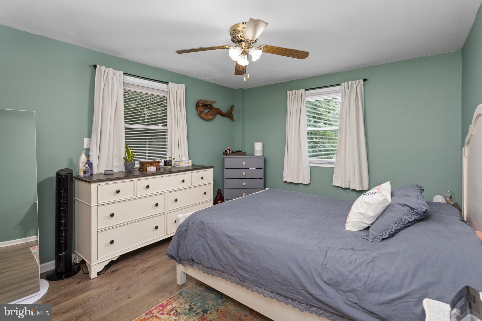 517 8 Street Riverside, NJ 08075 - Photo 13 of 29 a bedroom with a bed and a dresser
