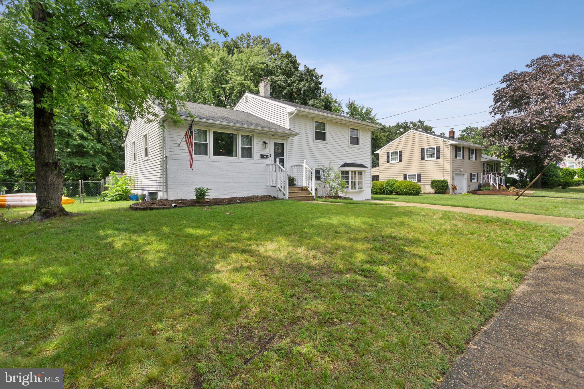 517 8 Street Riverside, NJ 08075 - Photo 2 of 29 a front view of a house with a yard