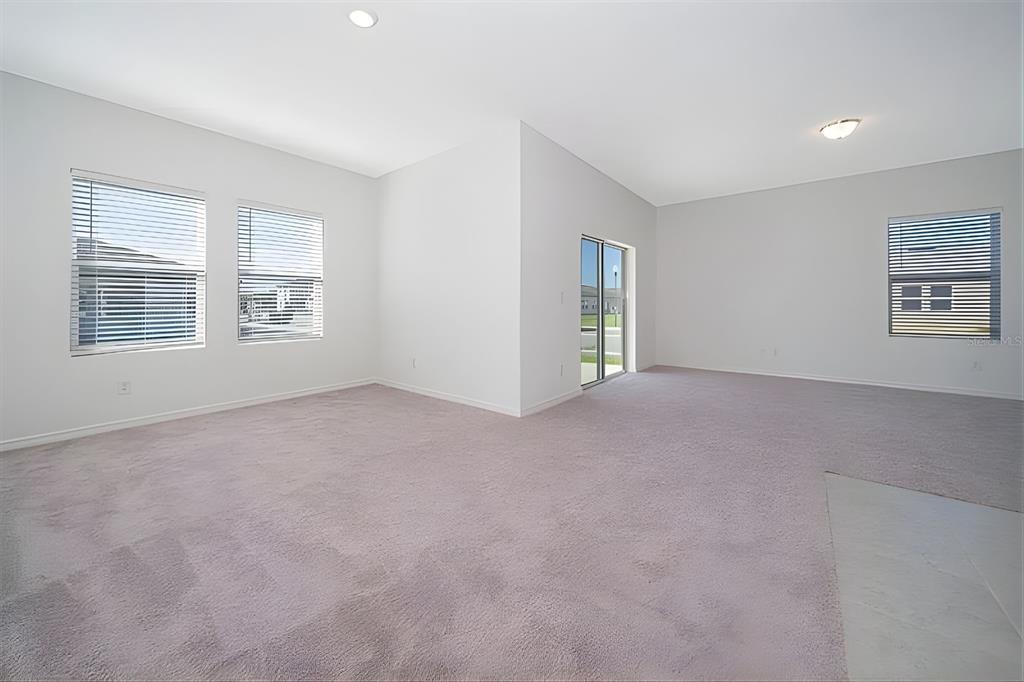 5844 Bovine Drive St. Cloud, FL 34771 - Photo 11 of 21 a view of an empty room with a window