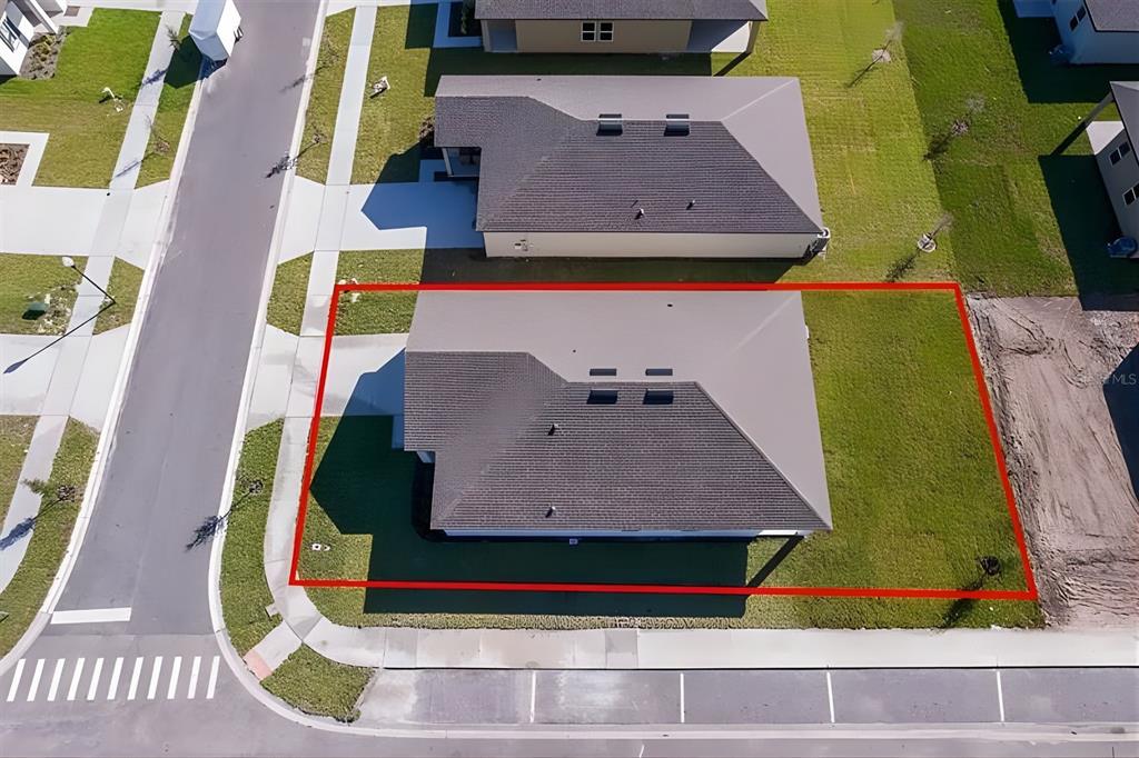 5844 Bovine Drive St. Cloud, FL 34771 - Photo 4 of 21 an aerial view of a house