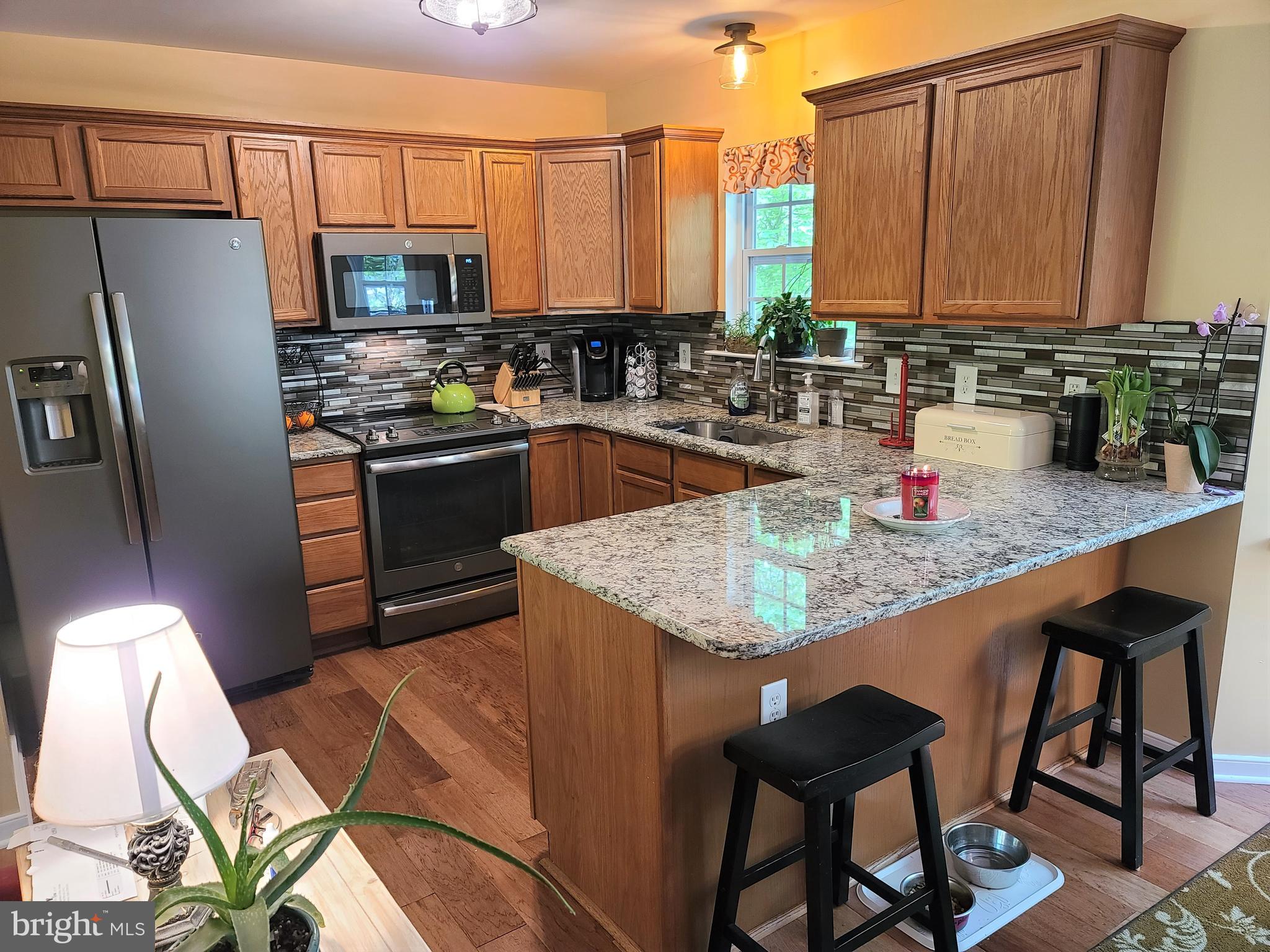 787 Reedy Creek Road Louisa, VA 23093 - Photo 8 of 29 Recently Renovated Kitchen w/Tile Backsplash