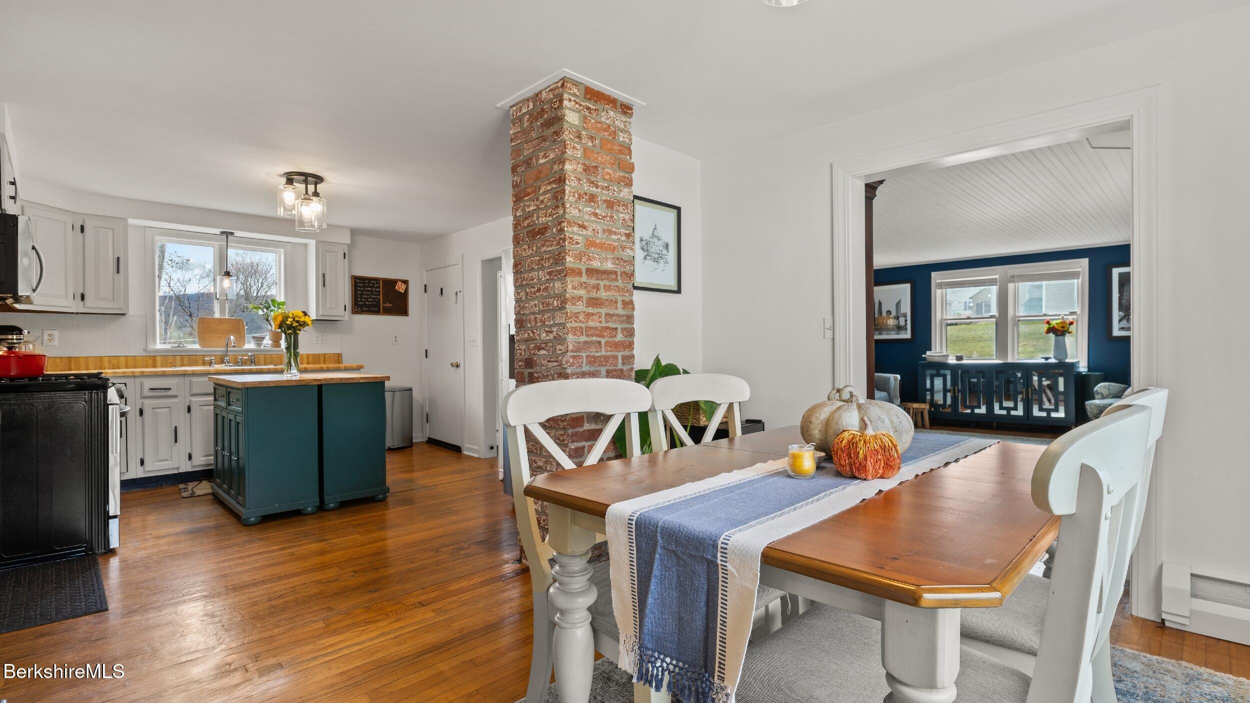 8 Catherine Street Lenox, MA 01242 - Photo 14 of 52 a dining room with furniture and wooden floor