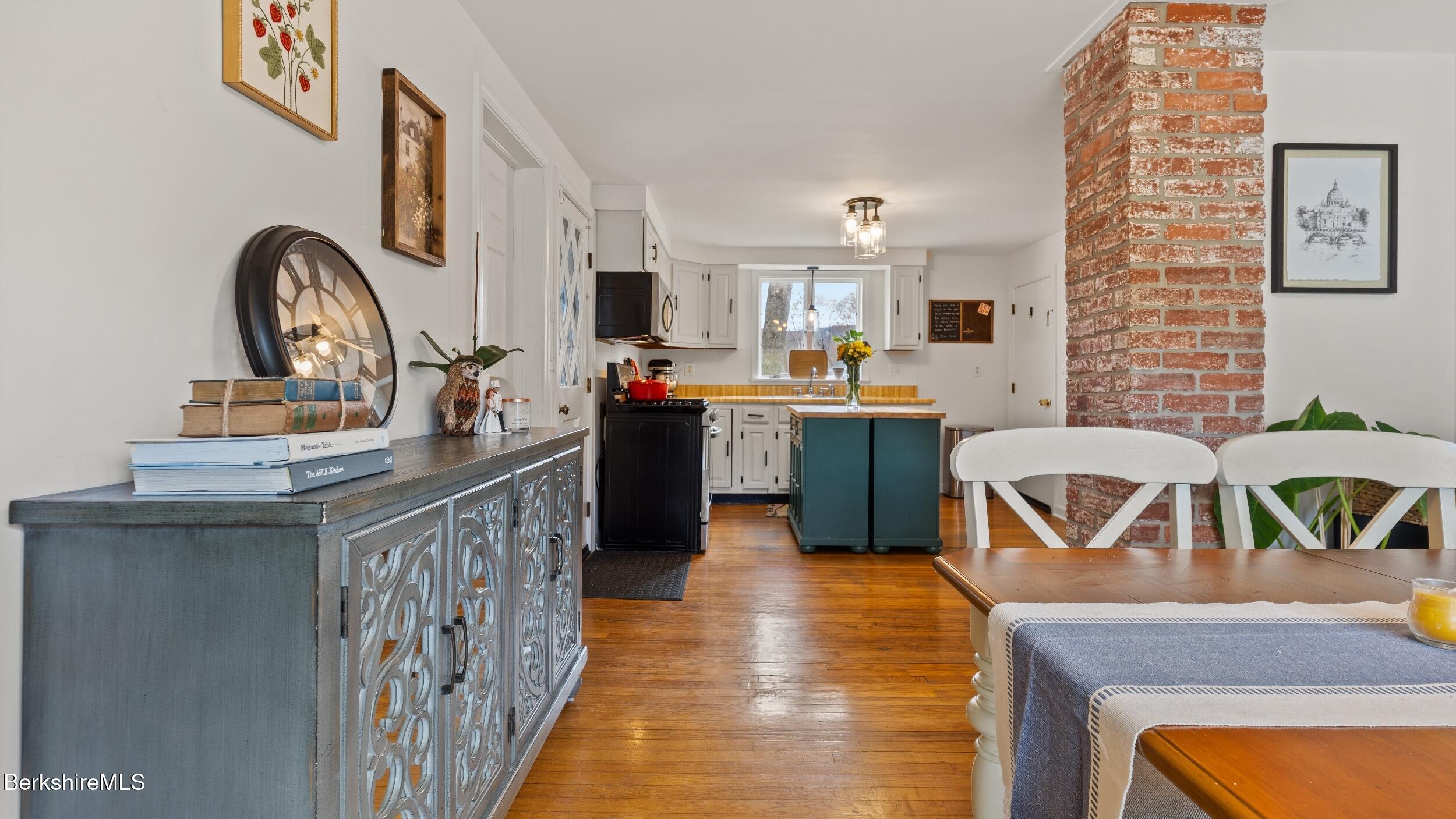 8 Catherine Street Lenox, MA 01242 - Photo 15 of 52 a kitchen that has a sink and a stove