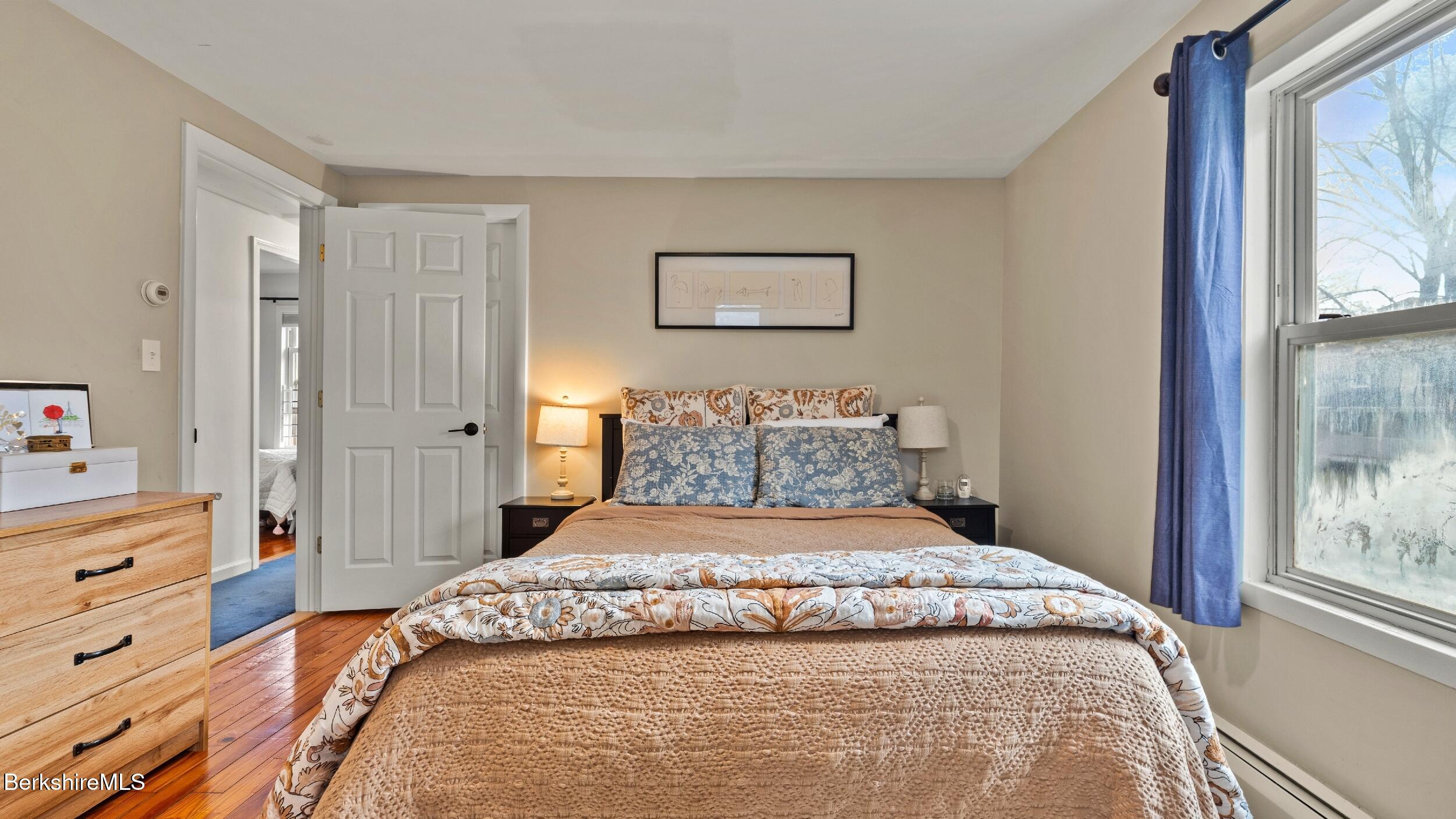 8 Catherine Street Lenox, MA 01242 - Photo 24 of 52 a bedroom with a bed and a window