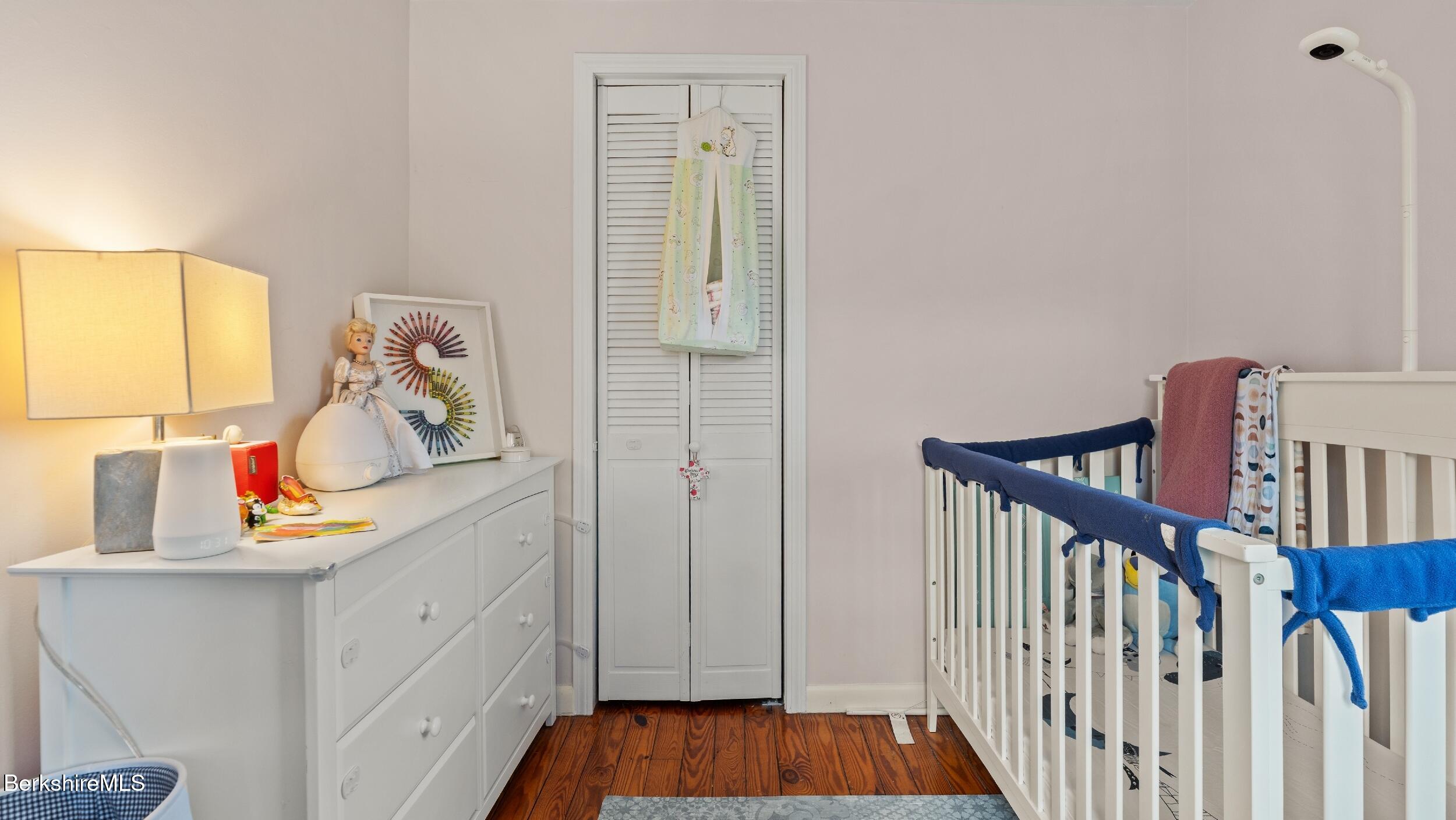 8 Catherine Street Lenox, MA 01242 - Photo 26 of 52 a view of hallway with wooden floor and cabinet