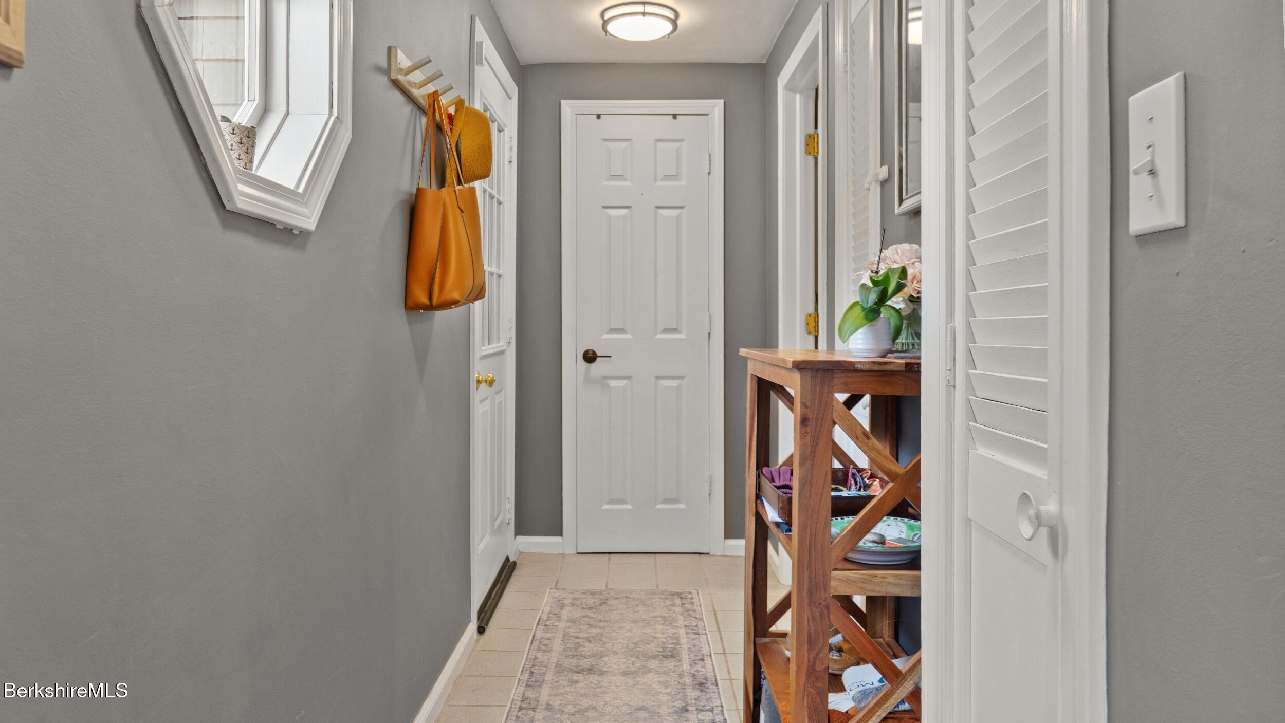 8 Catherine Street Lenox, MA 01242 - Photo 34 of 52 a view of an entryway with wooden floor