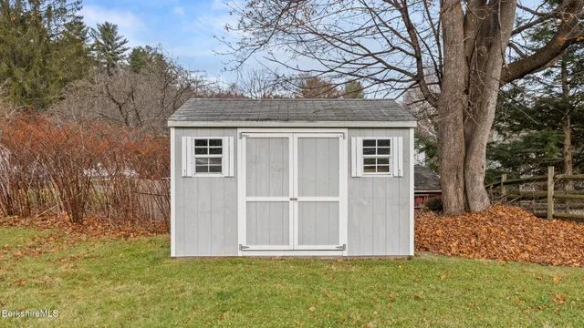a front view of house with yard