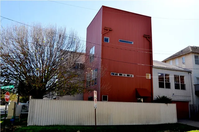 a view of a building with a street