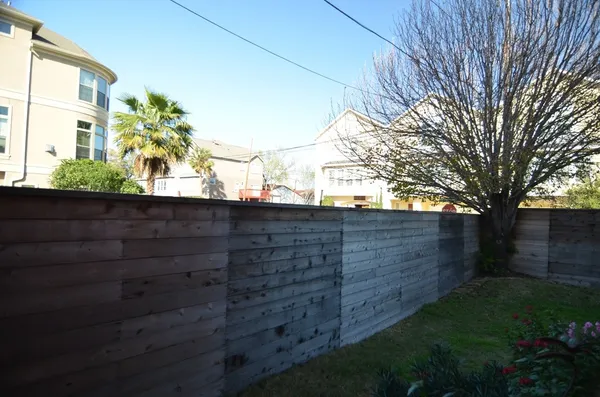 a view of a backyard of the house