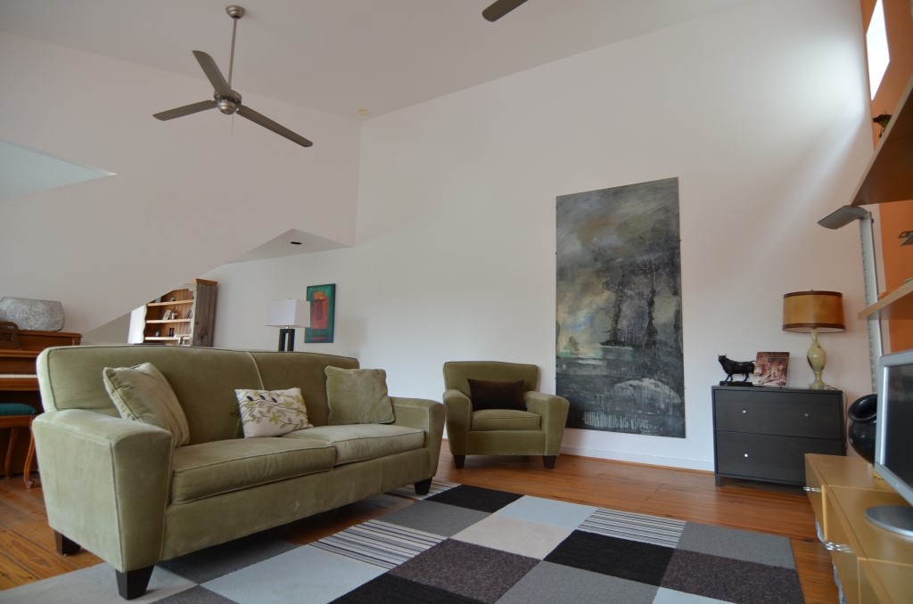 5401 Lillian Street Houston, TX 77007 - Photo 6 of 26 a living room with furniture and a rug