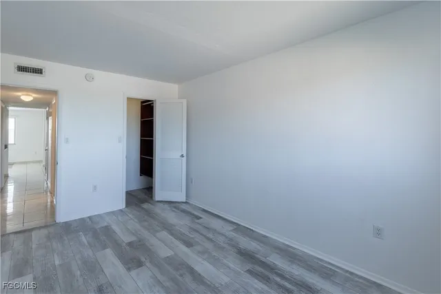 a bathroom with a shower a sink and a toilet
