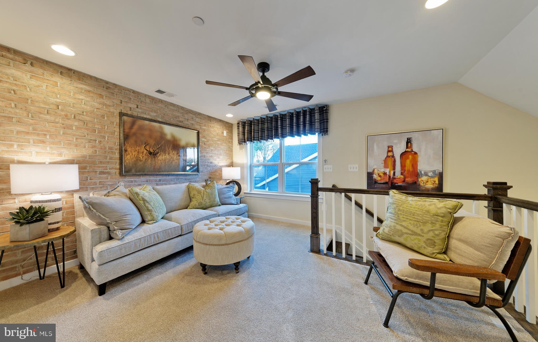 1007 Champlain Court Trappe, MD 21673 - Photo 14 of 54 a living room with furniture and a large window
