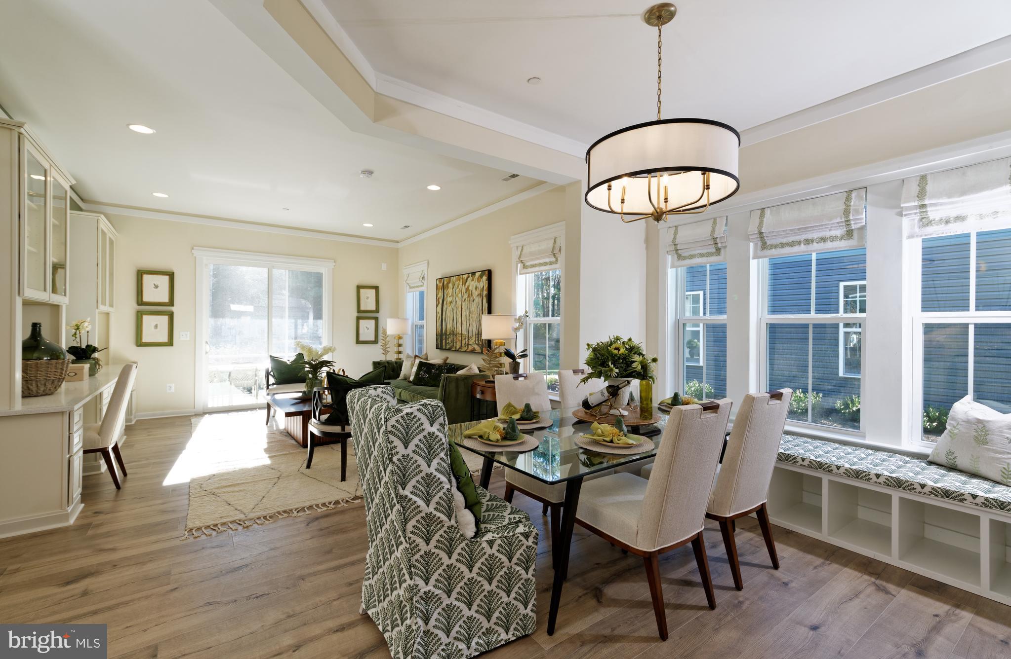 1007 Champlain Court Trappe, MD 21673 - Photo 4 of 54 a view of a dining room with furniture window and wooden floor