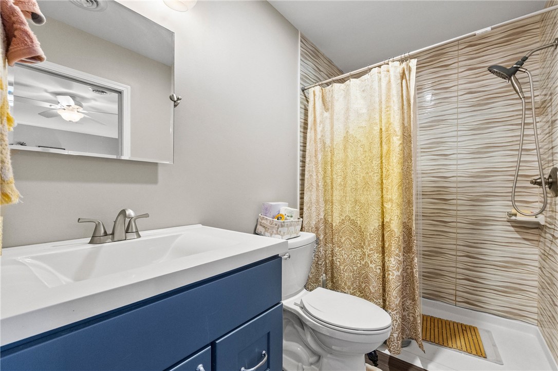 1140 Willits Road Ontario, NY 14519 - Photo 35 of 50 Inlaw bath with no step shower entry and pocket door to bedroom.