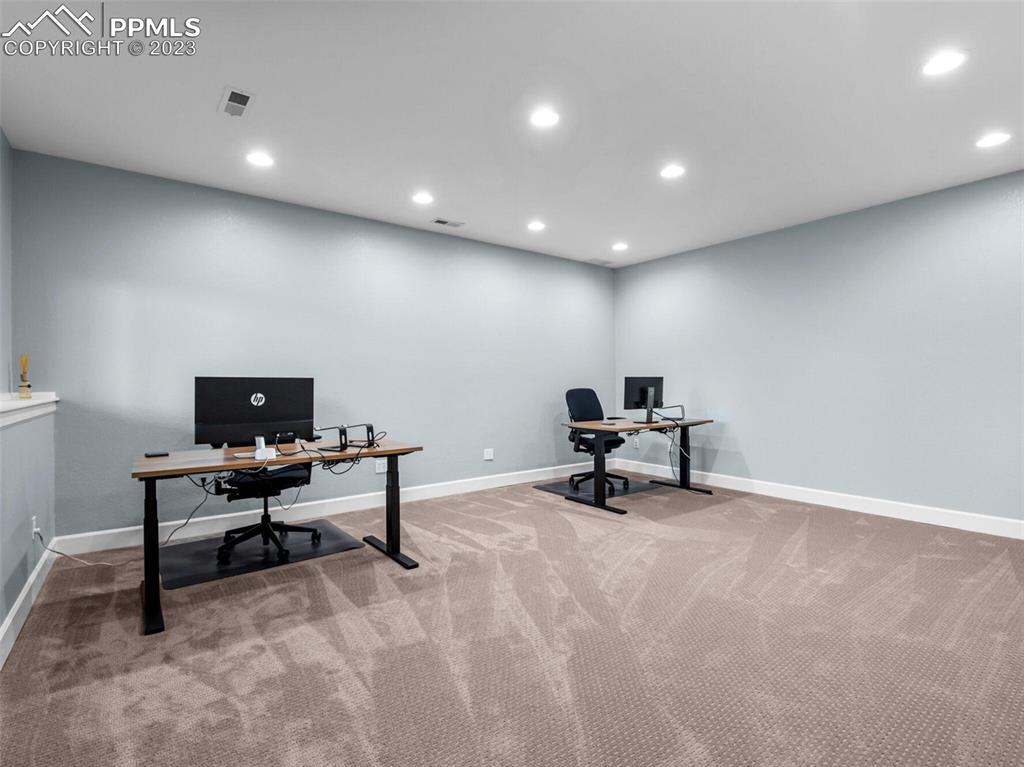 133 Matthew Road Divide, CO 80814 - Photo 25 of 37 a living room with furniture and a rug