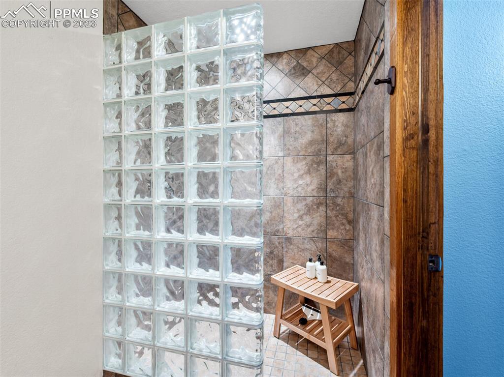 133 Matthew Road Divide, CO 80814 - Photo 27 of 37 a bathroom with a window and a shower