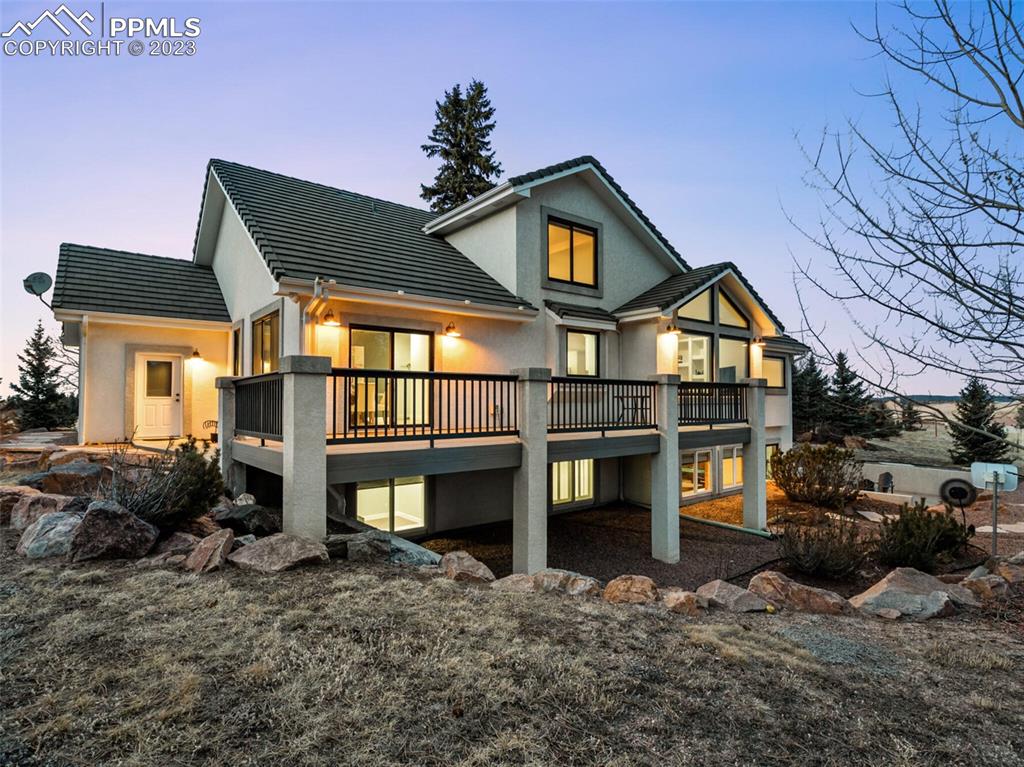 133 Matthew Road Divide, CO 80814 - Photo 32 of 37 a front view of a house with a yard