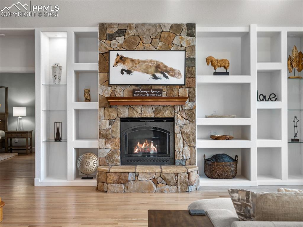 133 Matthew Road Divide, CO 80814 - Photo 7 of 37 a living room with furniture and a fireplace