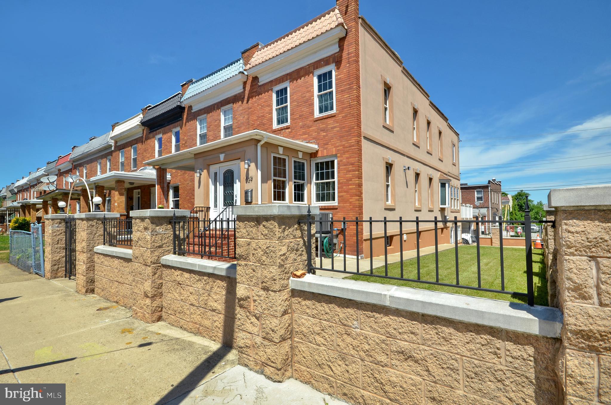 639 Rappolla Street Baltimore, MD 21224 - Photo 1 of 30 Gated Gorgeous End Unit w/ Spacious Yard & Parking