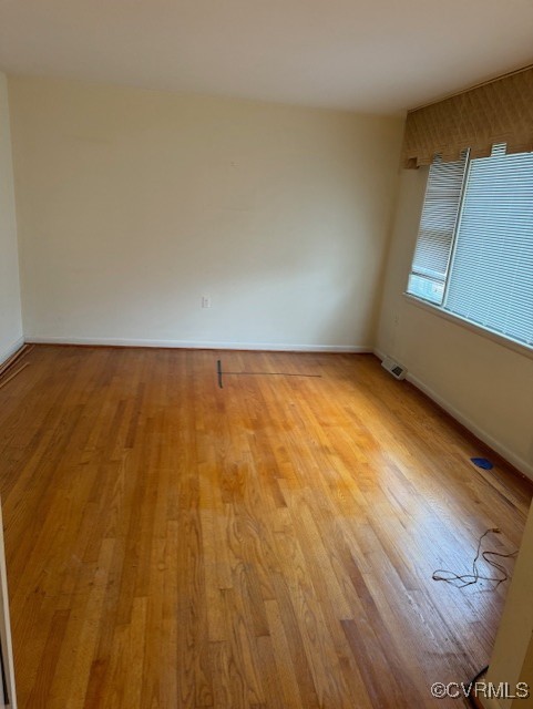 7707 Anoka Road Henrico, VA 23229 - Photo 14 of 21 Living room level one with light hardwood / wood-