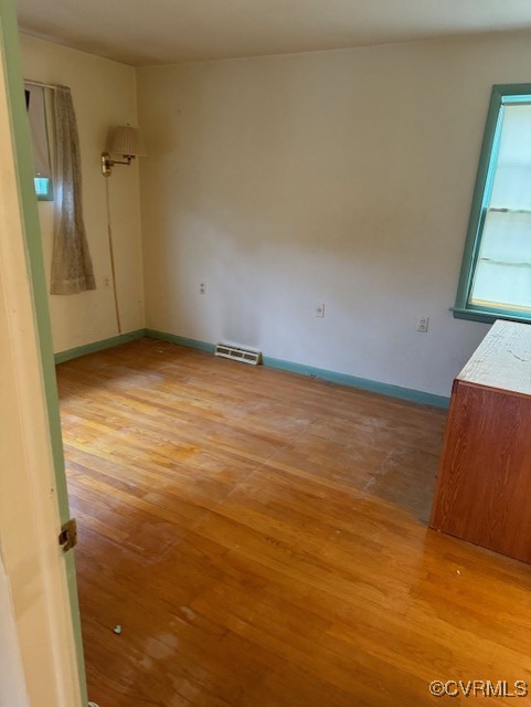7707 Anoka Road Henrico, VA 23229 - Photo 18 of 21 primary bedroom with light hardwood / wood-style f