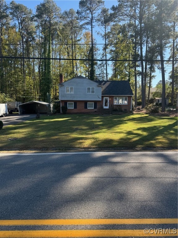 7707 Anoka Road Henrico, VA 23229 - Photo 2 of 21 View of front of property with a front lawn