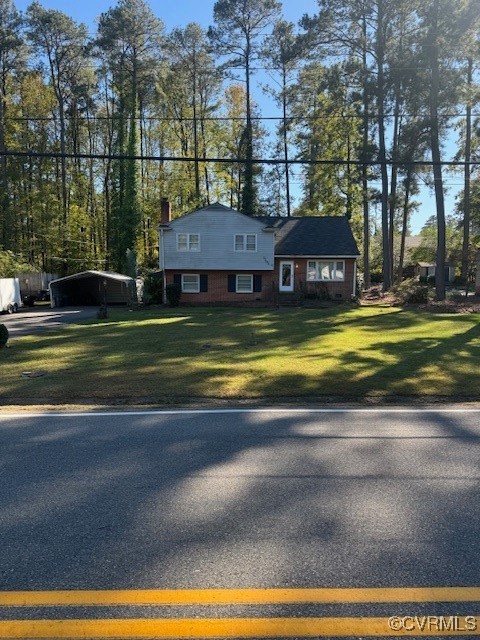 7707 Anoka Road Henrico, VA 23229 - Photo 6 of 21 View of front of property featuring a front yard