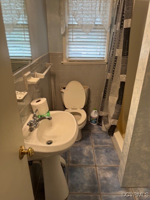7707 Anoka Road Henrico, VA 23229 - Photo 8 of 21 Basement level Bathroom featuring toilet, tile wal