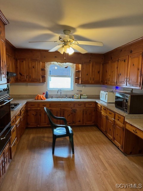 7707 Anoka Road Henrico, VA 23229 - Photo 10 of 21 Kitchen featuring knotty pine cabinets sink, ceili