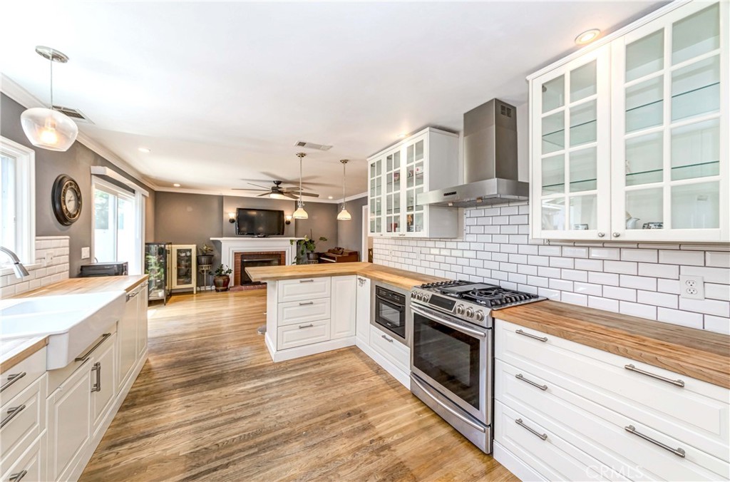 2175 Calavera Place Fullerton, CA 92833 - Photo 14 of 51 a kitchen with stainless steel appliances granite countertop a stove and a sink