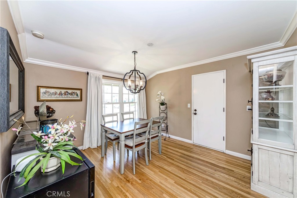 2175 Calavera Place Fullerton, CA 92833 - Photo 15 of 51 a view of a dining room with furniture window and wooden floor