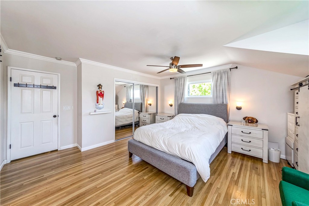 2175 Calavera Place Fullerton, CA 92833 - Photo 24 of 51 a spacious bedroom with a bed and a dresser