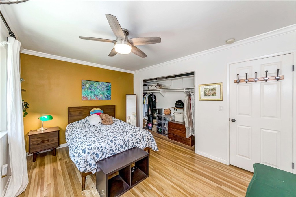 2175 Calavera Place Fullerton, CA 92833 - Photo 29 of 51 a living room with furniture and a wooden floor