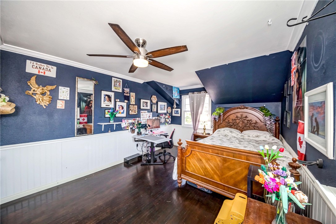 2175 Calavera Place Fullerton, CA 92833 - Photo 31 of 51 a bedroom with furniture and a book shelf