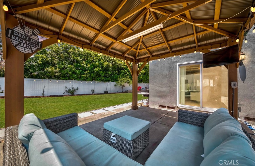 2175 Calavera Place Fullerton, CA 92833 - Photo 39 of 51 a backyard of a house with garden and outdoor seating