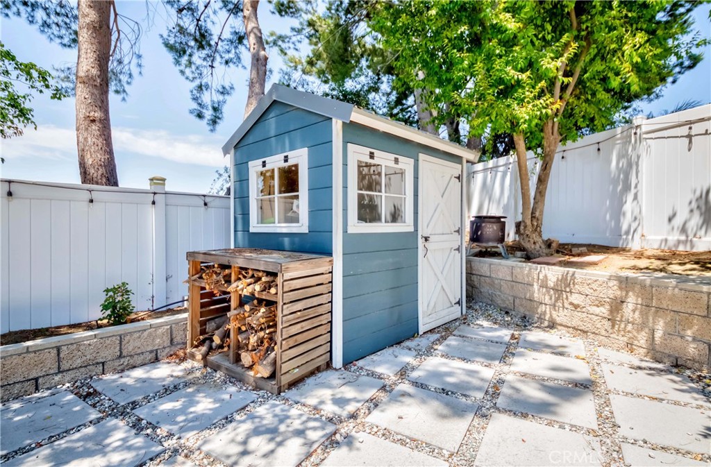 2175 Calavera Place Fullerton, CA 92833 - Photo 46 of 51 a view of a house with a yard plants and large tree