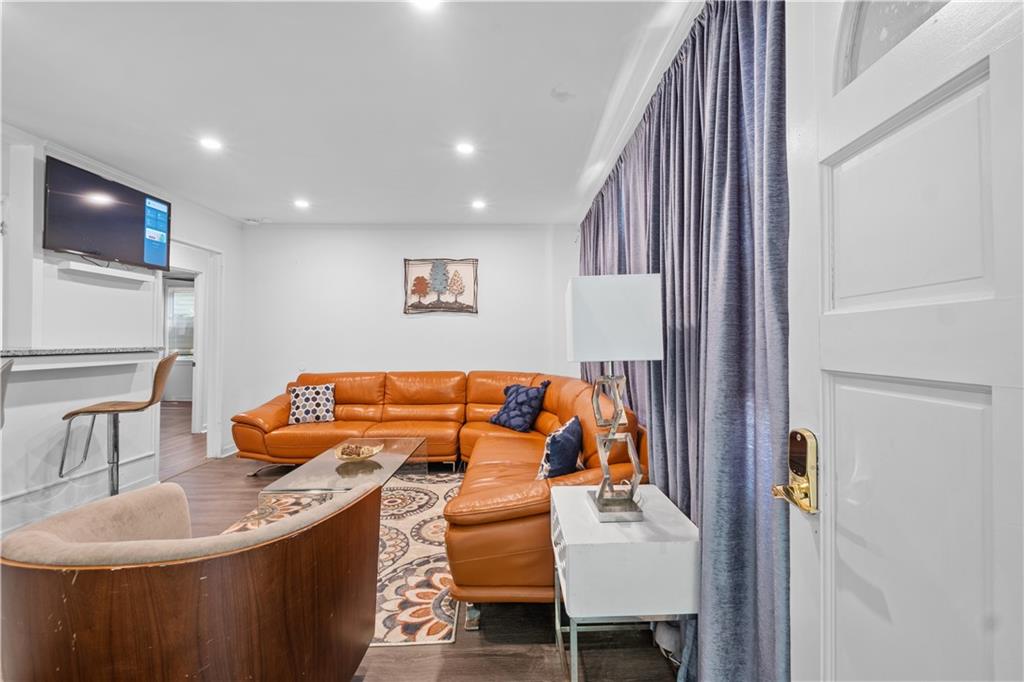 1738 Duke Road Atlanta, GA 30341 - Photo 2 of 23 a bedroom with a bed and a couch