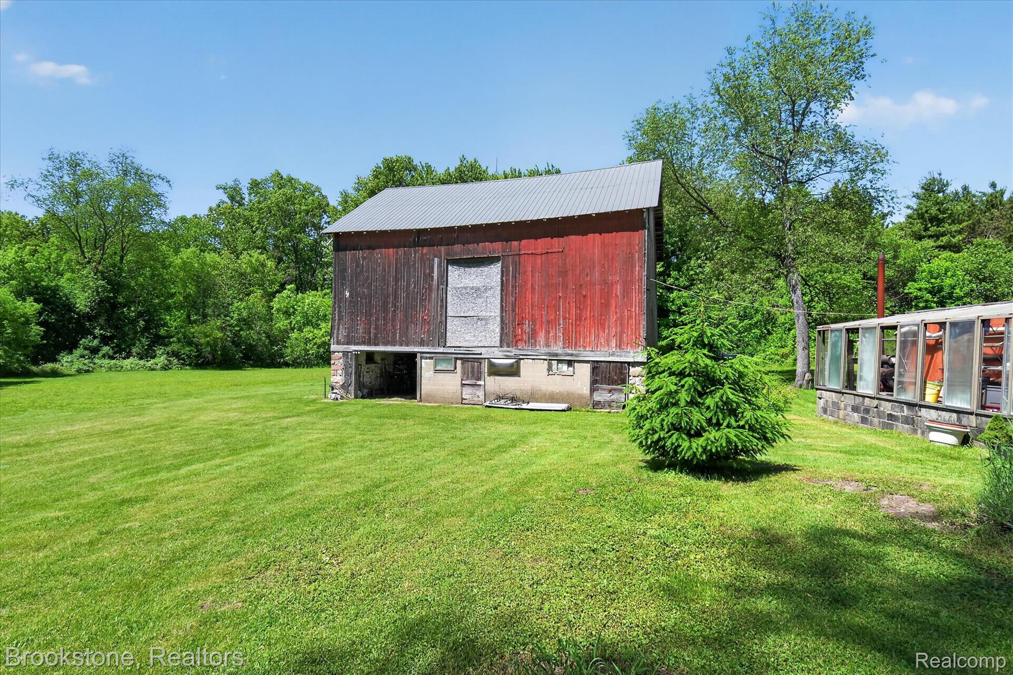 9455 Andersonville Road Clarkston, MI 48346 - Photo 57 of 82 Barn and greenhouse
