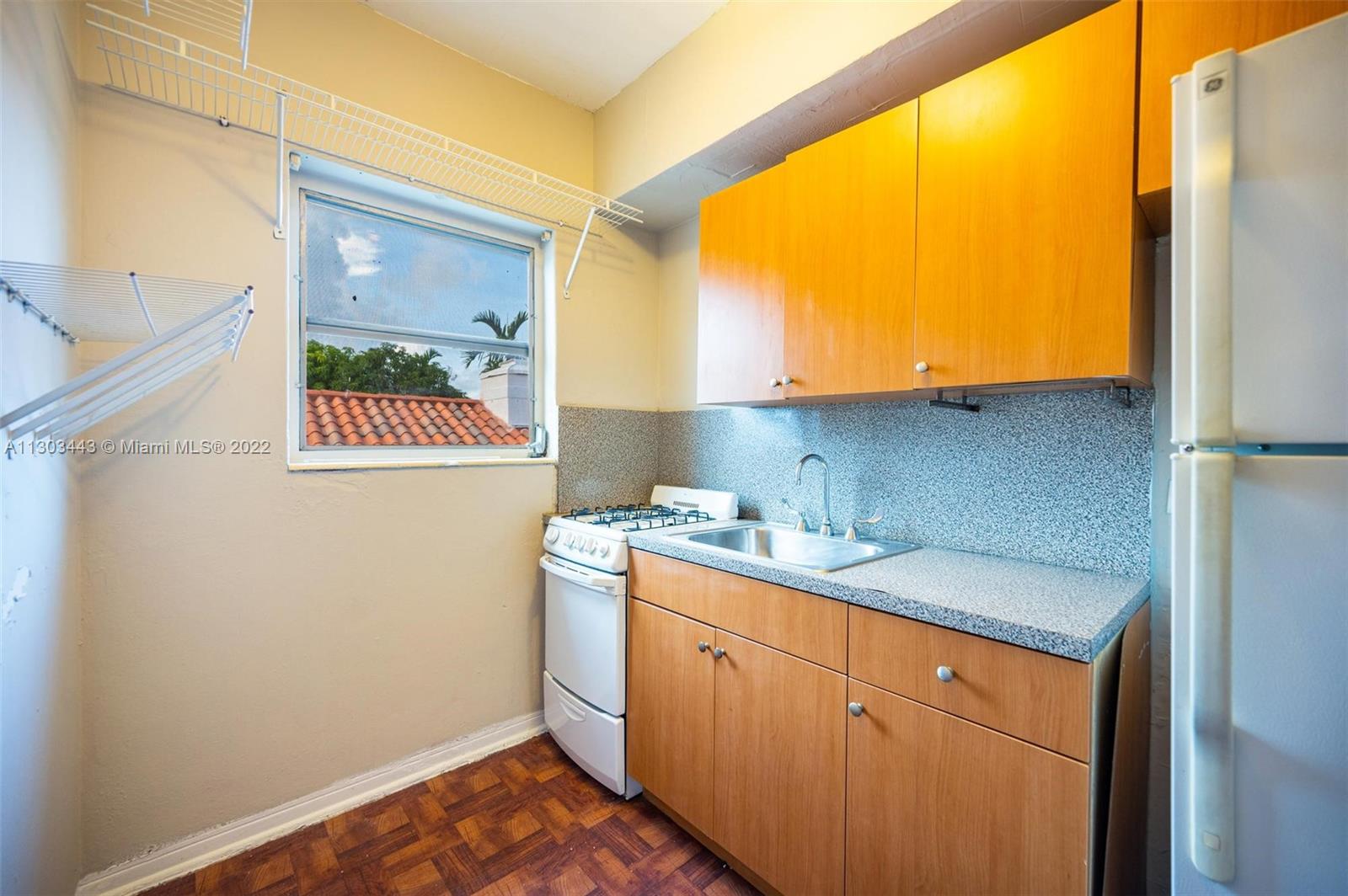 825 Alton Road, Unit 7 Miami Beach, FL 33139 - Photo 7 of 8 a room with storage and utility