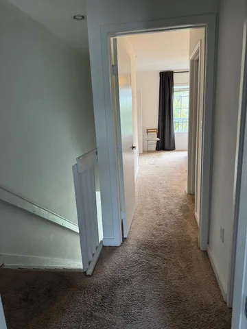 a view of a hallway with entryway