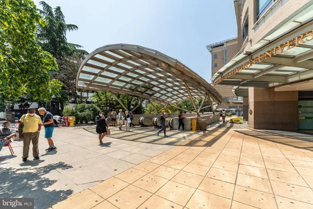 a view of a patio with a table and chairs