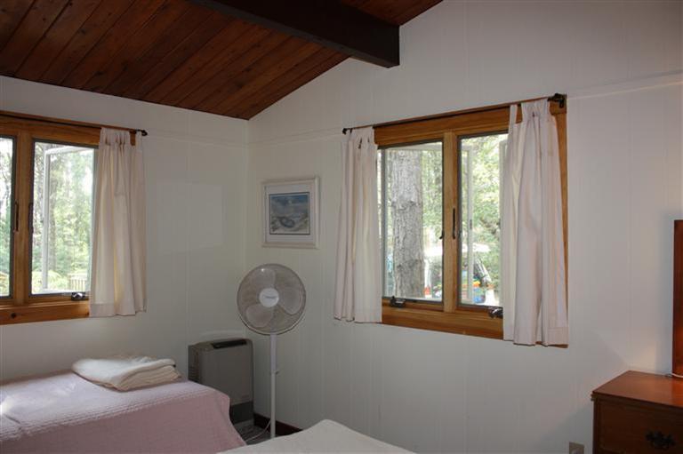 30 Fox Island Road, Unit 10D Wellfleet, MA 02667 - Photo 11 of 17 a room with furniture and a window