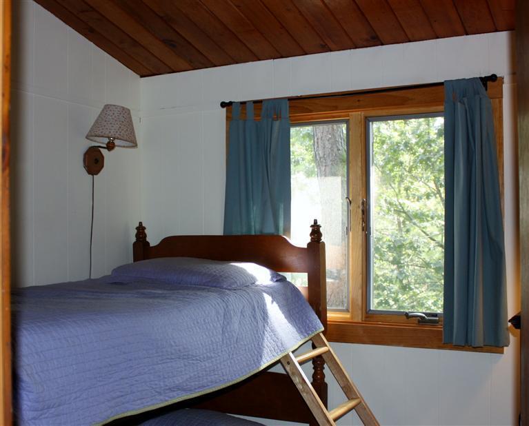 30 Fox Island Road, Unit 10D Wellfleet, MA 02667 - Photo 12 of 17 a bedroom with a bed and a window