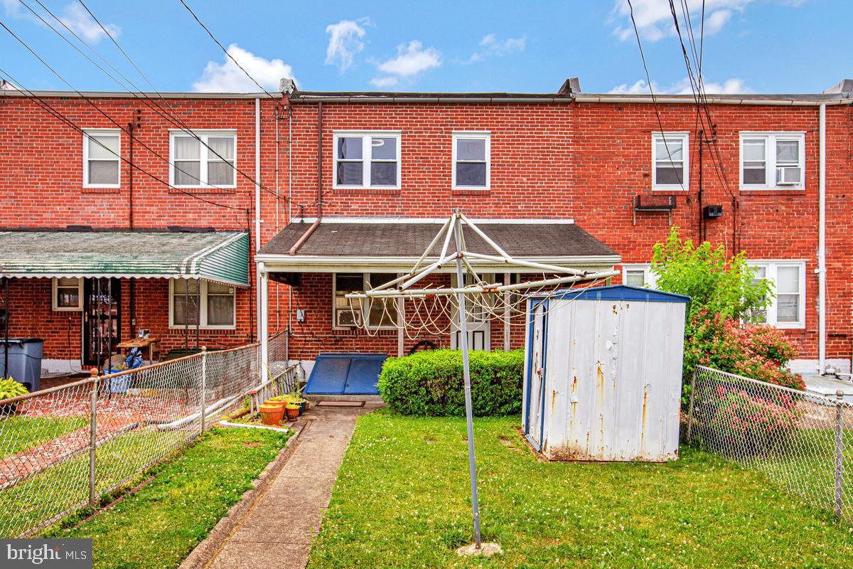 3040 Federal Street Baltimore, MD 21213 - Photo 36 of 41 a view of a house with backyard and sitting area