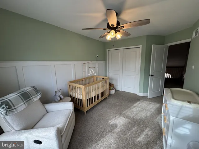 a bedroom with a bed and furniture