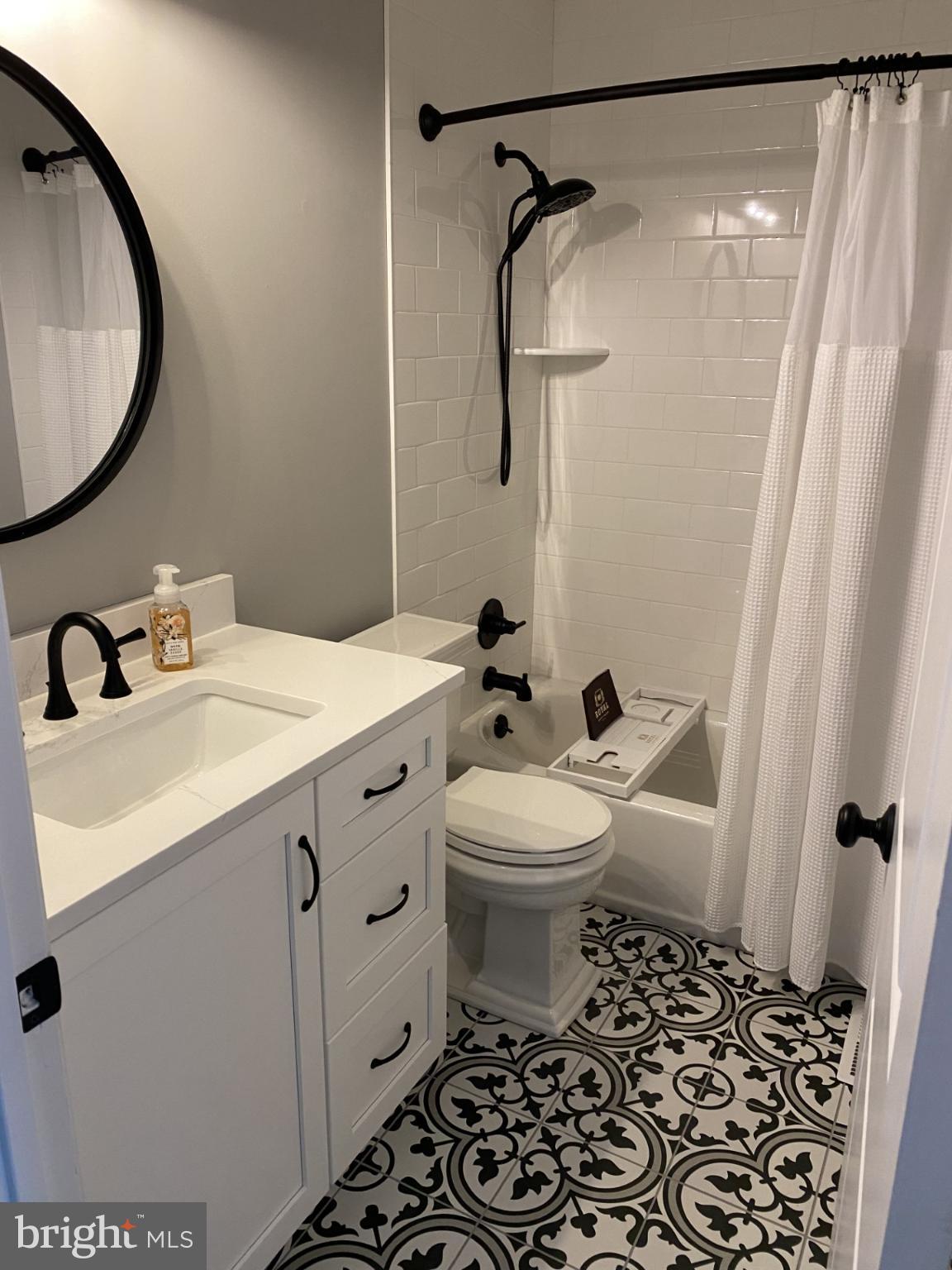424 Trumbull Court Newtown, PA 18940 - Photo 17 of 21 a bathroom with a sink toilet and shower