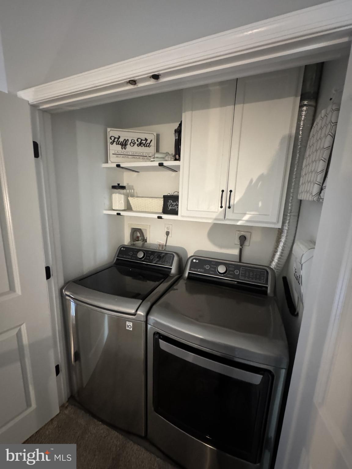 424 Trumbull Court Newtown, PA 18940 - Photo 19 of 21 a close view of a stove and a microwave