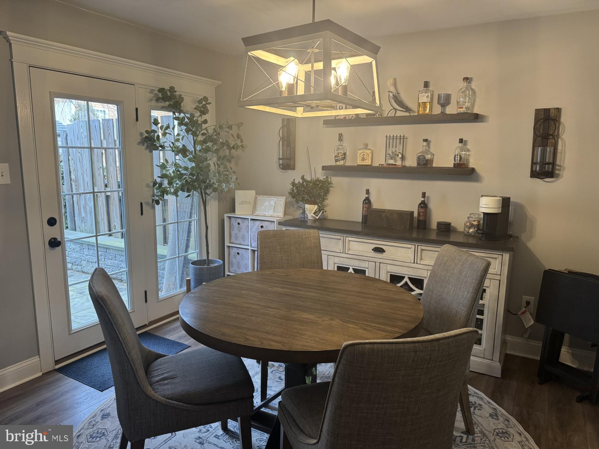 424 Trumbull Court Newtown, PA 18940 - Photo 6 of 21 a view of a dining room with furniture and chandelier