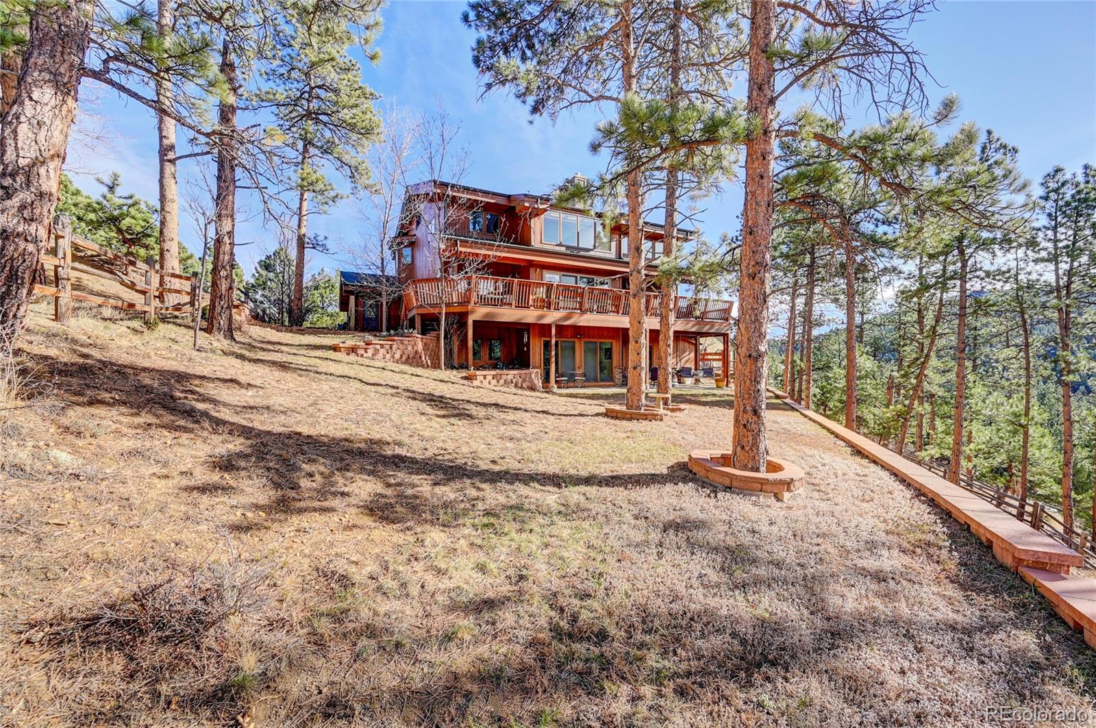 27164 Sun Ridge Drive Evergreen, CO 80439 - Photo 37 of 40 a view of a park with iron fence